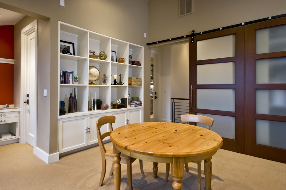 Mid-sized elegant carpeted kitchen/dining room combo photo in San Francisco with beige walls