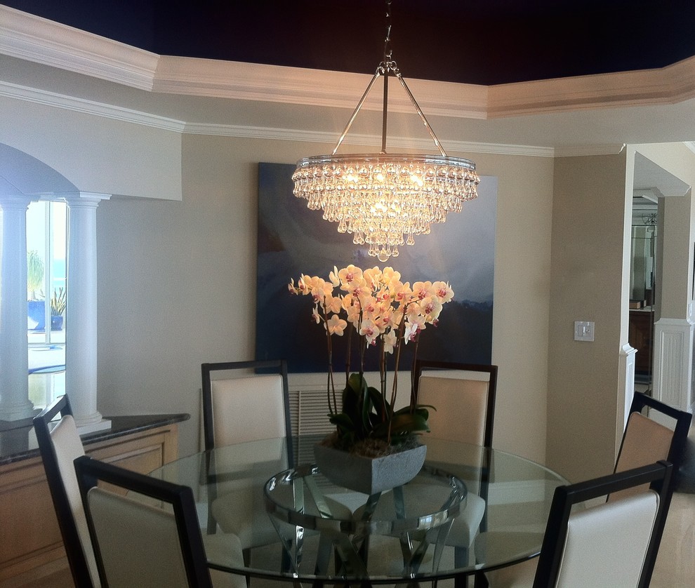 Example of a beach style dining room design in Miami