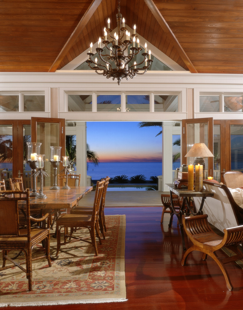 This is an example of a world-inspired open plan dining room in Tampa.