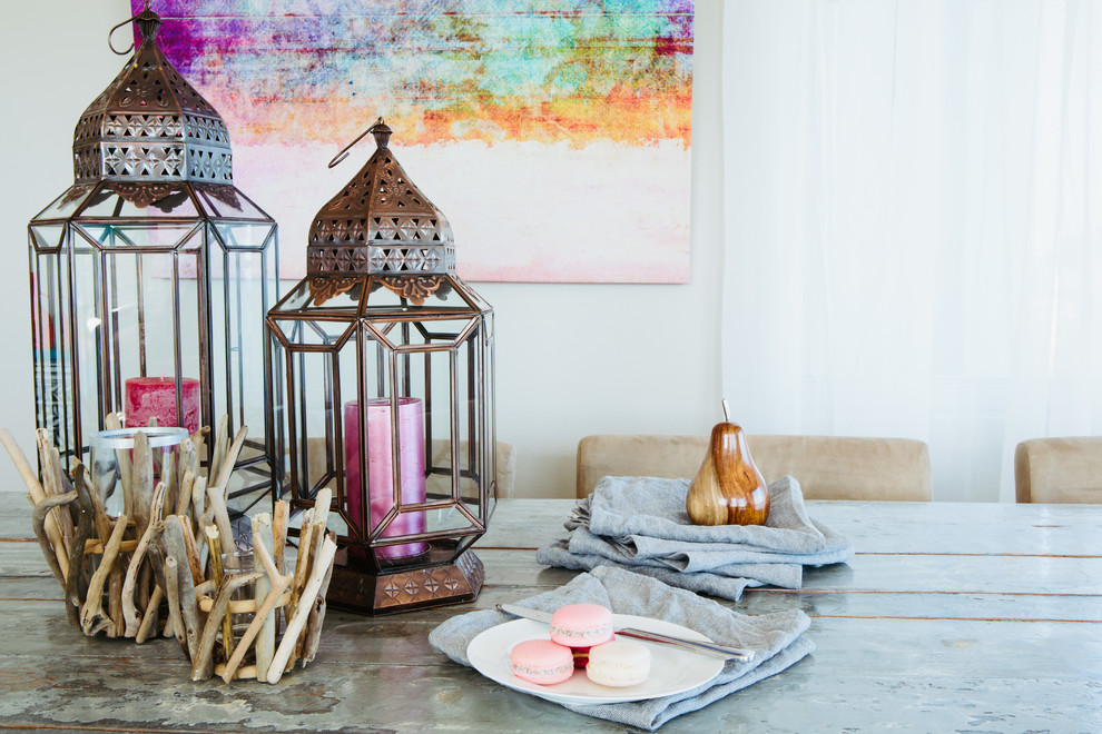 Dining room - small coastal medium tone wood floor dining room idea in Sydney with white walls