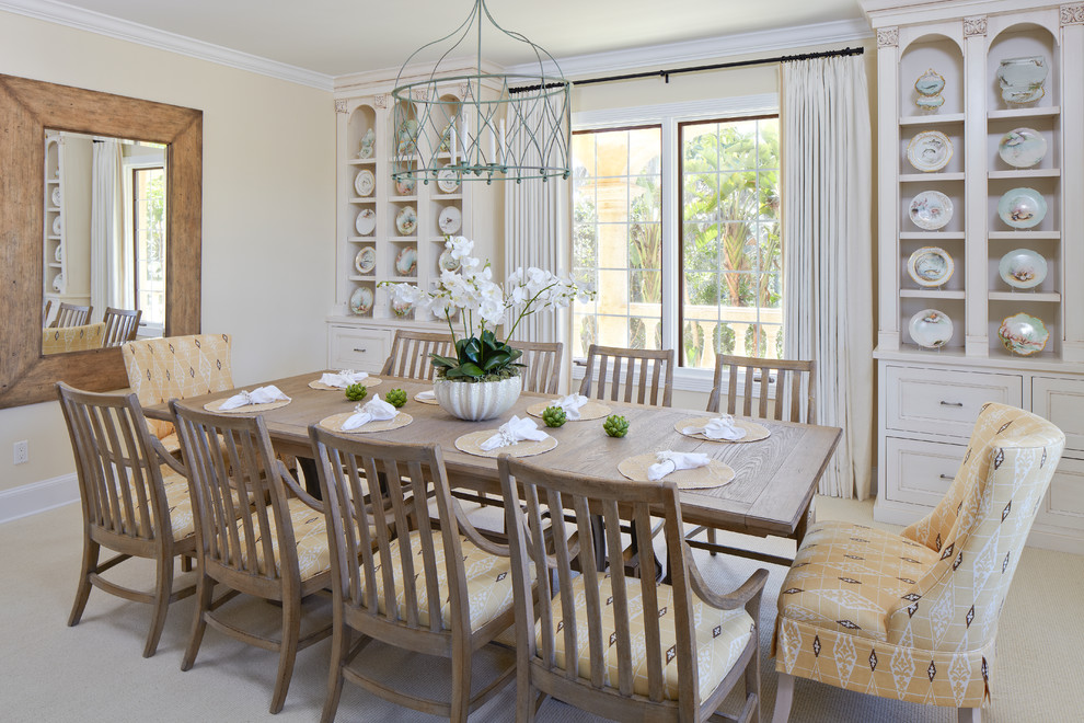 Dining room - traditional carpeted dining room idea in Miami with beige walls