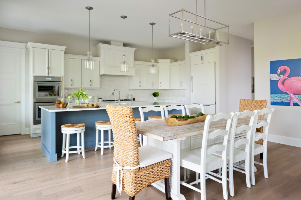 Inspiration for a coastal dining room in Tampa.