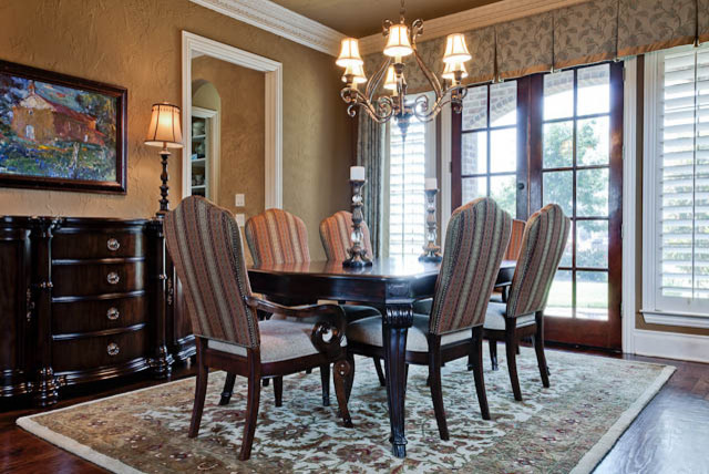 Elegant dining room photo in Dallas