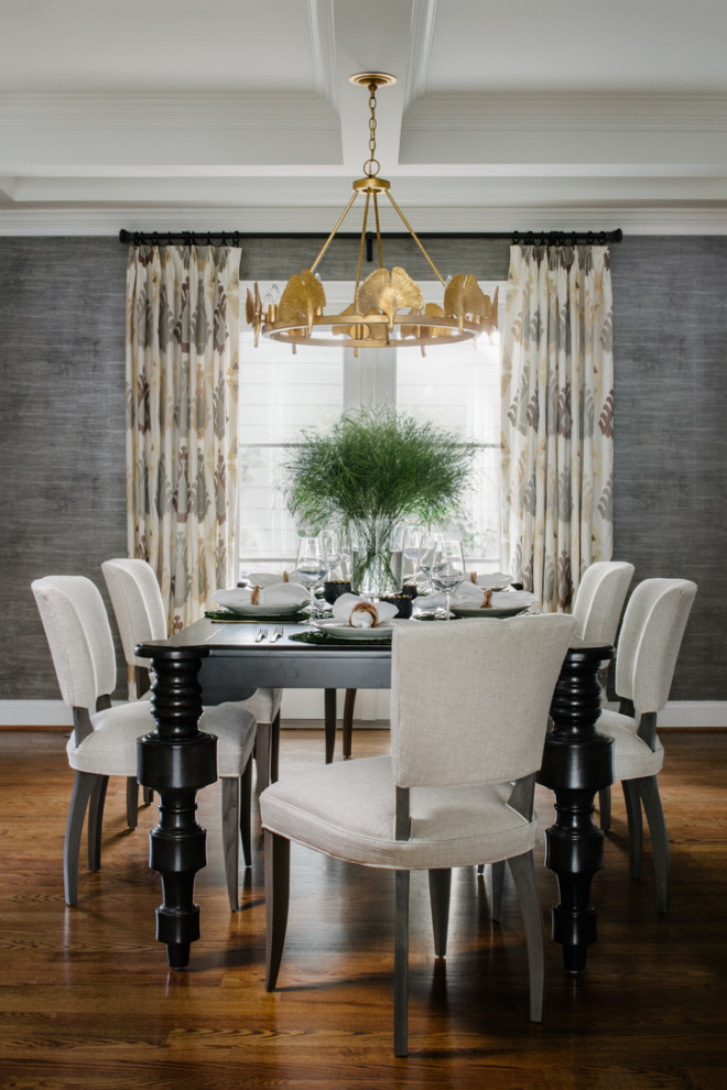This is an example of a large classic dining room in DC Metro with grey walls, medium hardwood flooring, brown floors and a coffered ceiling.