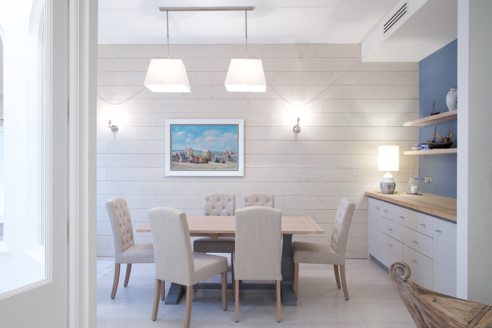 This is an example of a coastal dining room in London.