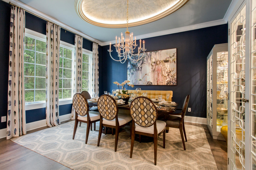 Inspiration for a transitional dark wood floor dining room remodel in Richmond with blue walls