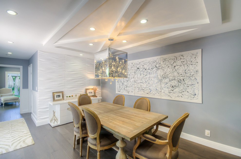 Mid-sized transitional medium tone wood floor kitchen/dining room combo photo in Los Angeles with gray walls