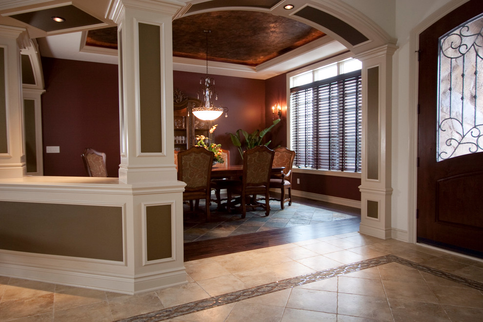 Example of a large transitional ceramic tile great room design in Cleveland with red walls and no fireplace