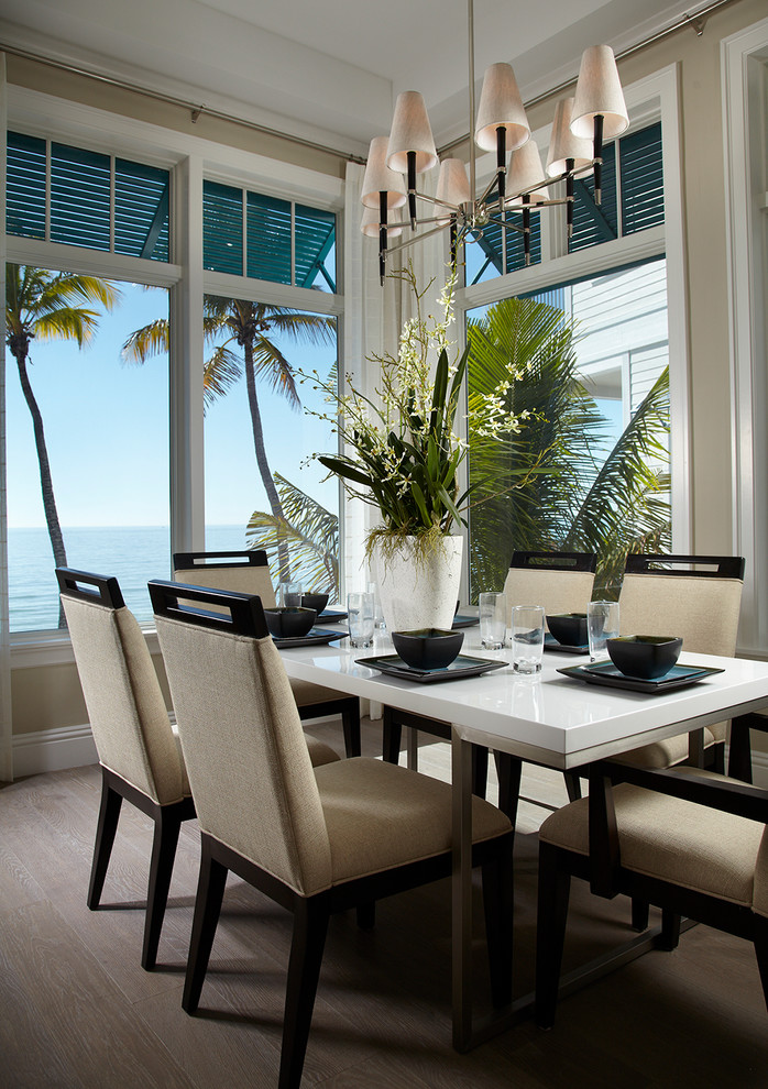 Nautical dining room in Miami with beige walls.