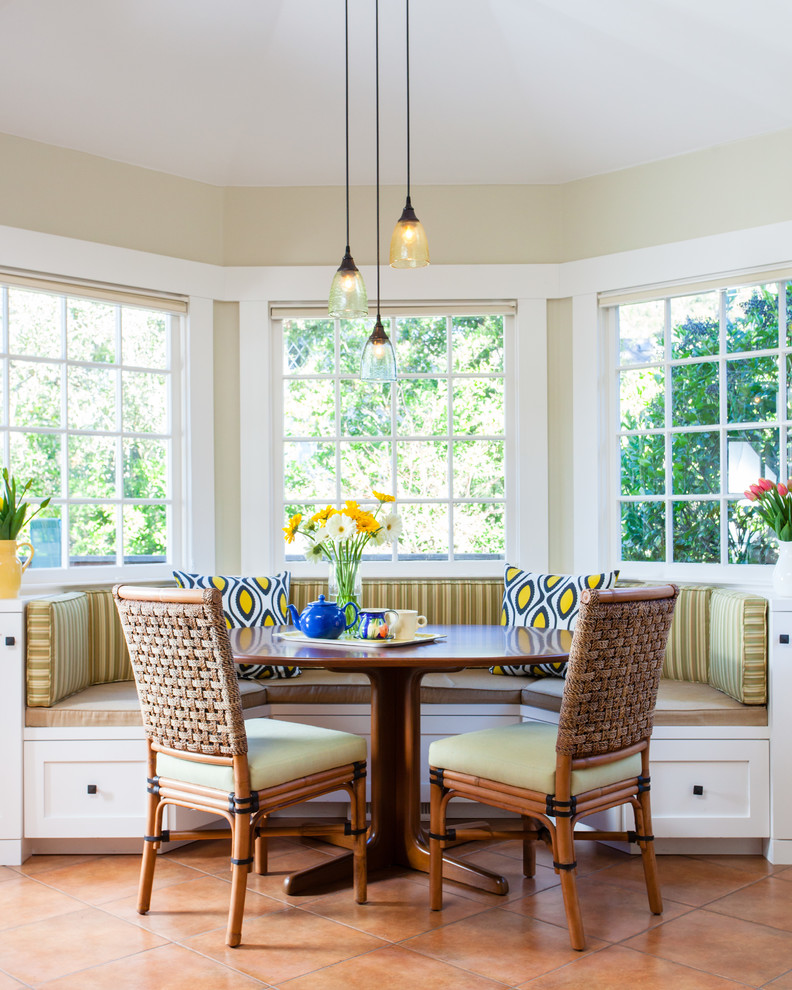 Mid-sized elegant terra-cotta tile kitchen/dining room combo photo in San Francisco with beige walls