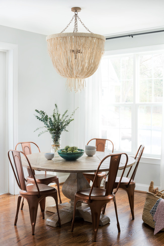 Design ideas for a medium sized traditional open plan dining room in Philadelphia with medium hardwood flooring, brown floors and blue walls.