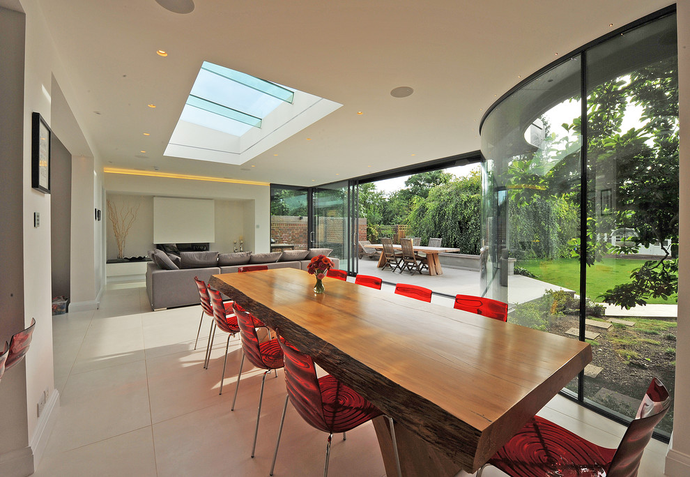 Design ideas for a large contemporary open plan dining room in London.