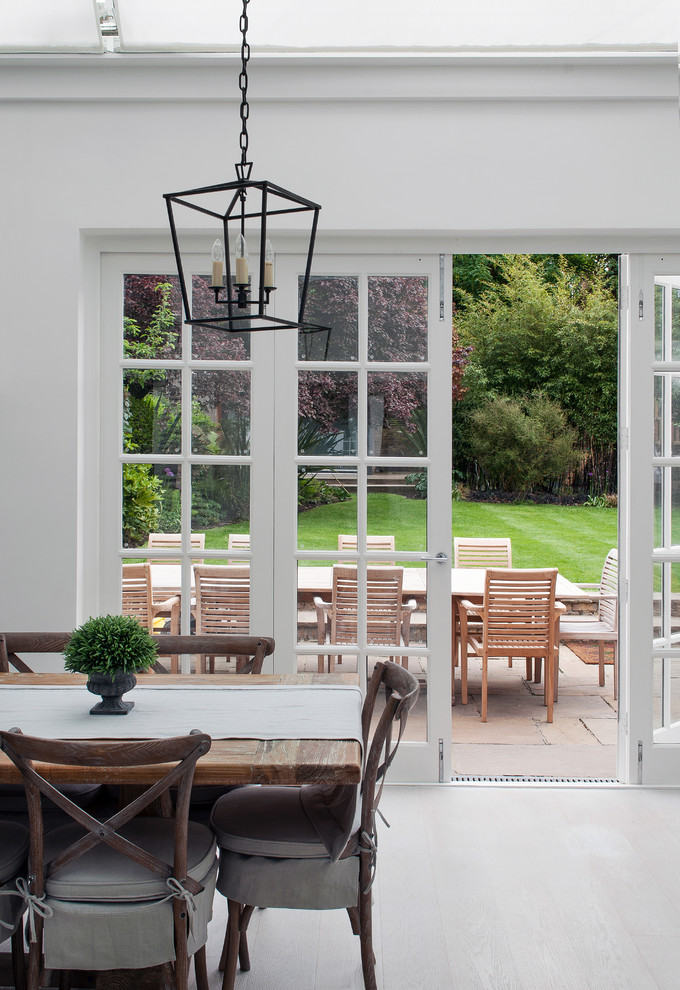 This is an example of a farmhouse dining room in London.