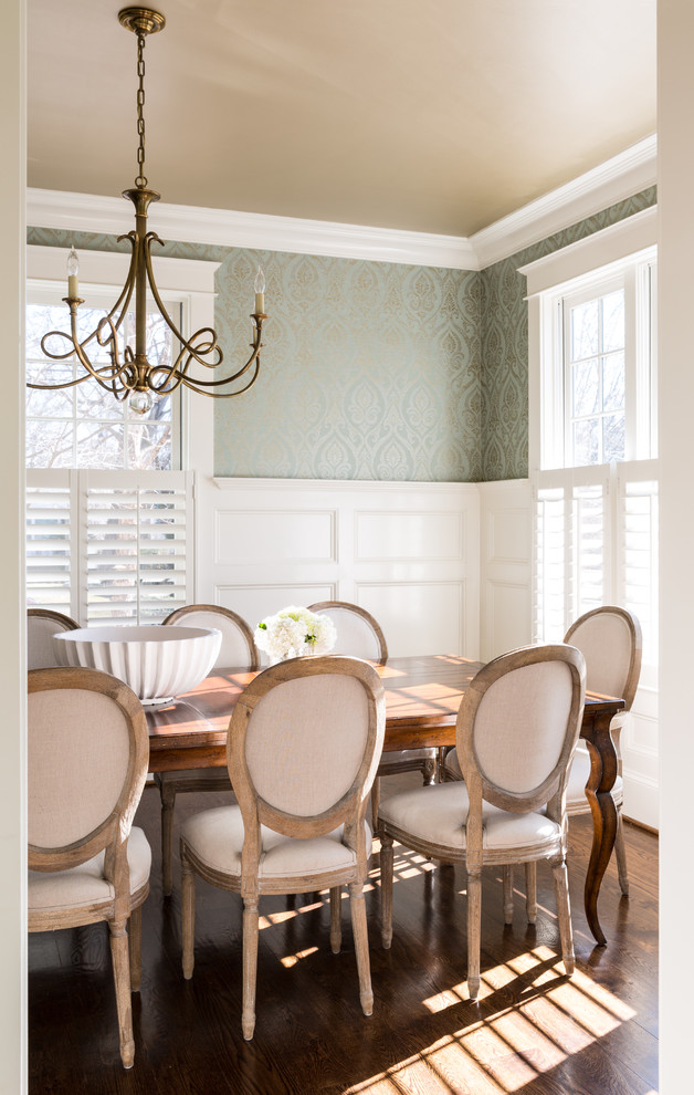 Elegant dark wood floor enclosed dining room photo in DC Metro with multicolored walls