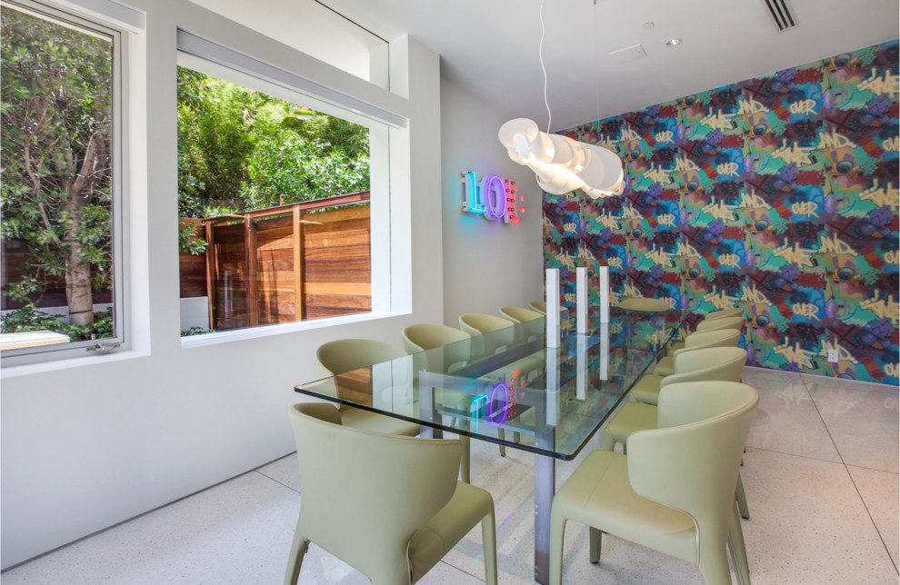This is an example of a large contemporary open plan dining room in Los Angeles with travertine flooring, multi-coloured walls and no fireplace.