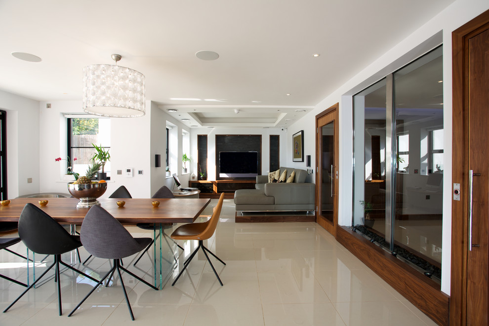 Inspiration for a large contemporary kitchen/dining room combo remodel in London