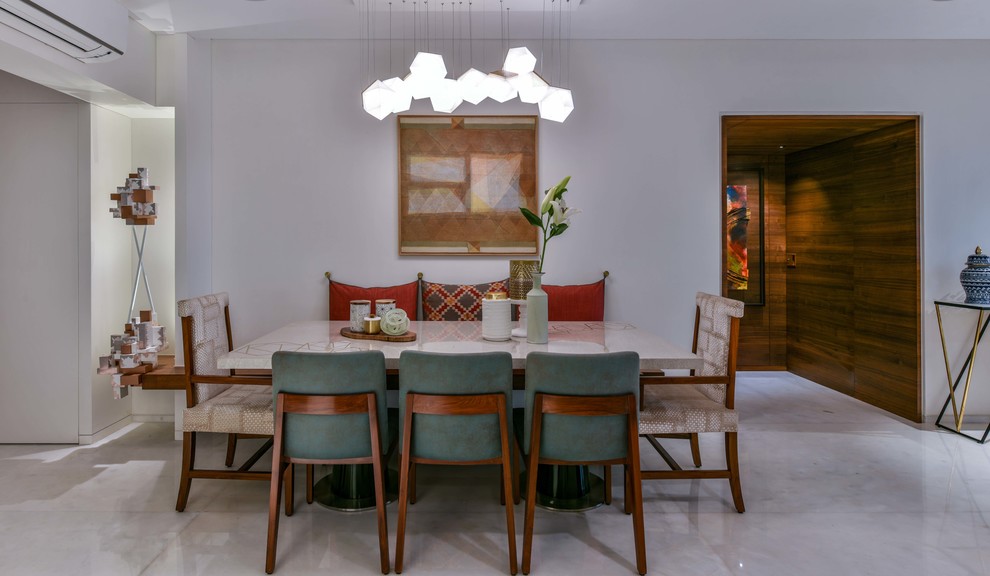 Inspiration for an asian dining room remodel in Mumbai