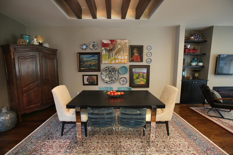 На фото: кухня-столовая среднего размера в стиле фьюжн с бежевыми стенами, темным паркетным полом, подвесным камином и коричневым полом с