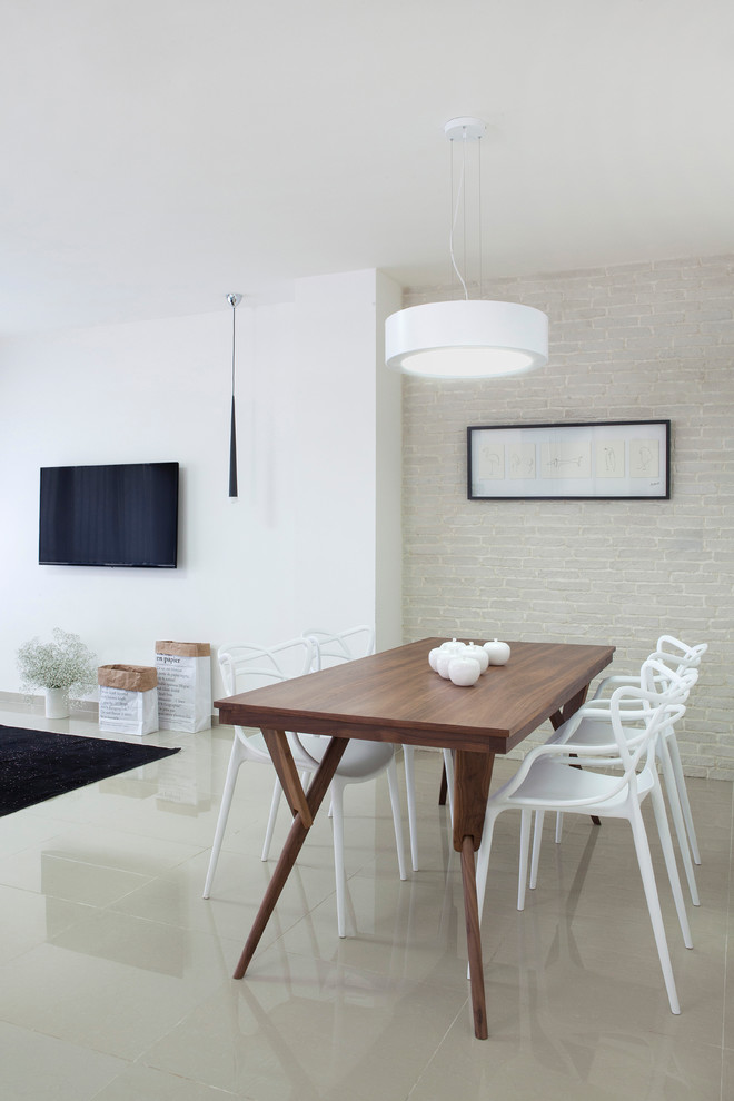 Photo of a scandinavian kitchen/dining room in Tel Aviv with white walls.