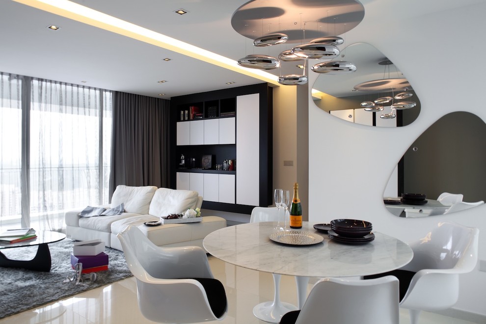 Inspiration for a contemporary dining room remodel in Singapore with white walls