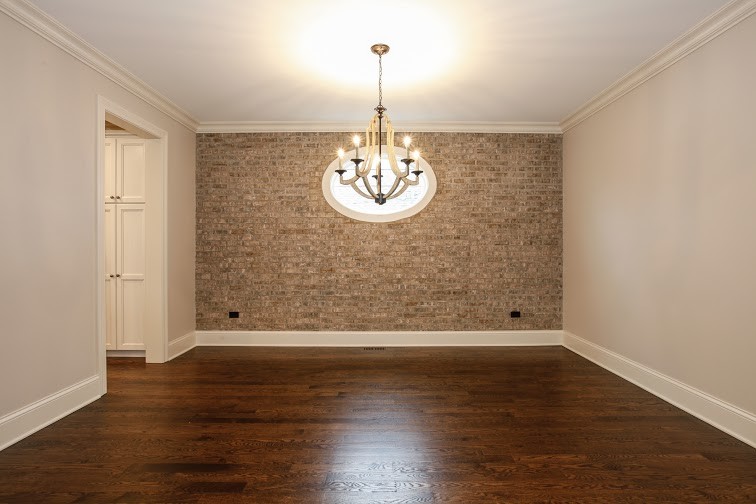 Medium sized classic dining room in Chicago with grey walls and medium hardwood flooring.