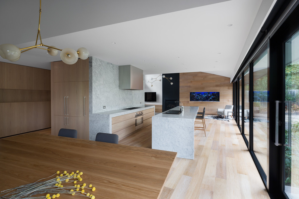 Inspiration for a large modern kitchen/dining room combo remodel in Melbourne with gray walls