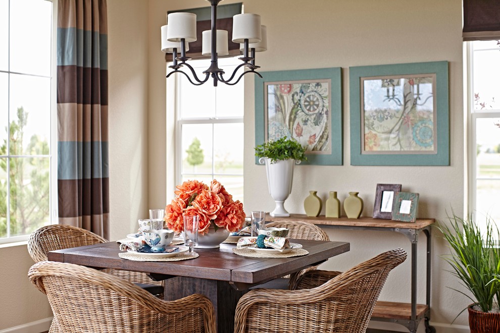 Example of a transitional dining room design in Denver