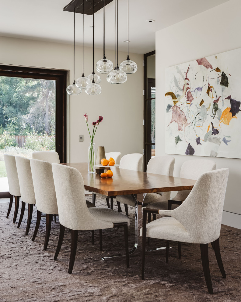 Contemporary enclosed dining room in Salt Lake City with white walls and no fireplace.