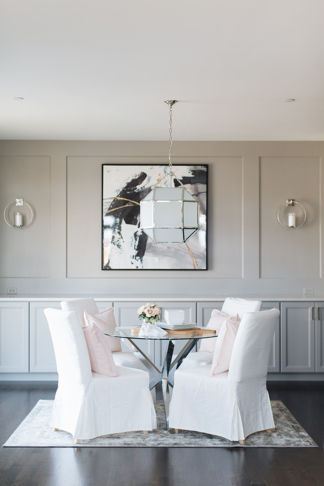 Classic enclosed dining room in Chicago with grey walls, dark hardwood flooring and brown floors.