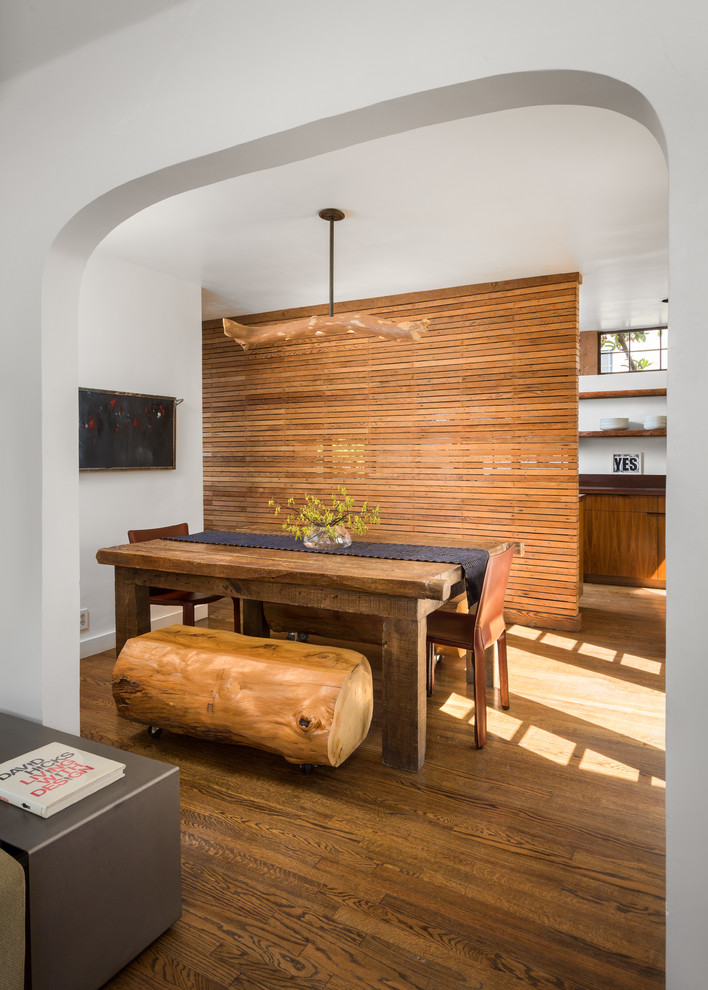 Kitchen/dining room combo - small contemporary medium tone wood floor and brown floor kitchen/dining room combo idea in Los Angeles with white walls and no fireplace