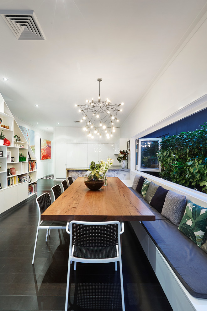 Design ideas for a contemporary dining room in Sydney with white walls.