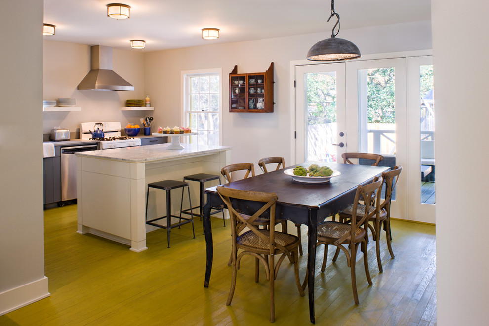 Kitchen/dining room combo - transitional green floor kitchen/dining room combo idea in Austin with white walls