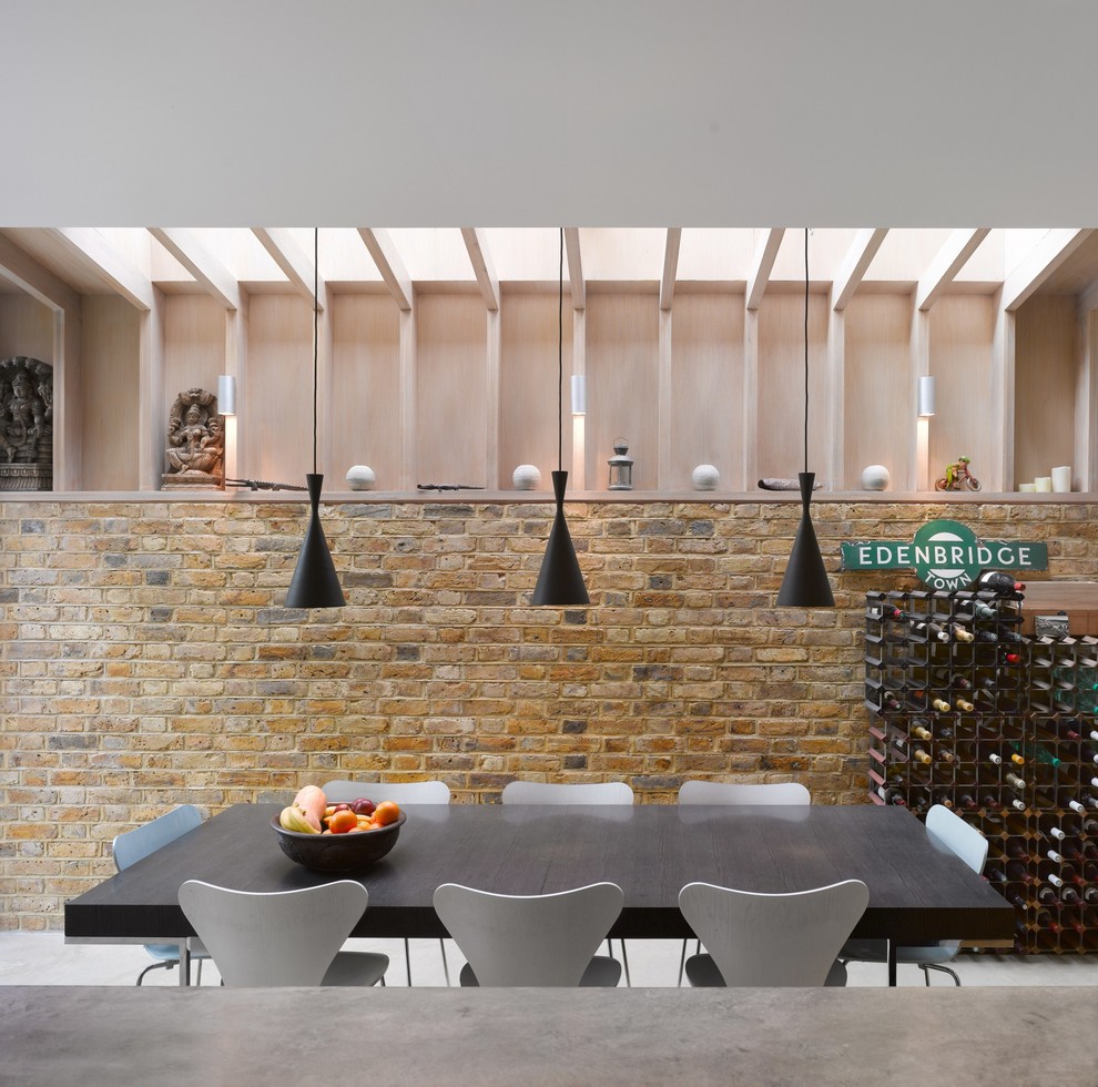 Photo of a contemporary kitchen/dining room in London with no fireplace.