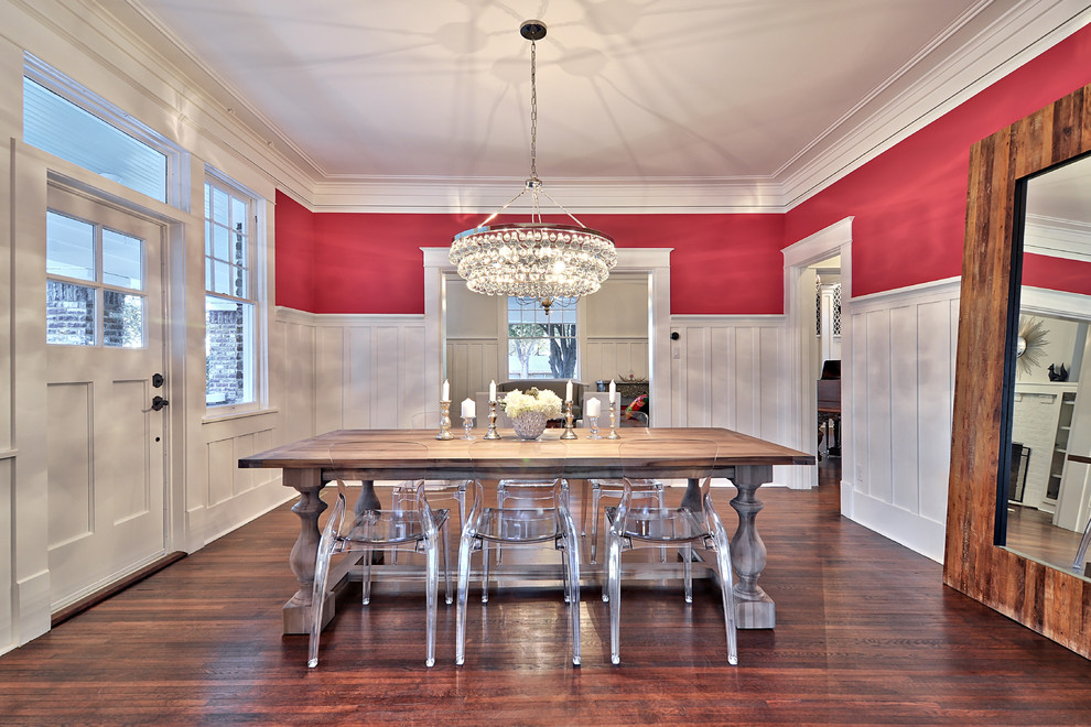 Trendy dark wood floor dining room photo in Austin with pink walls