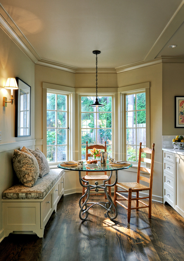 Example of a mid-sized classic dark wood floor kitchen/dining room combo design in Seattle with beige walls and no fireplace