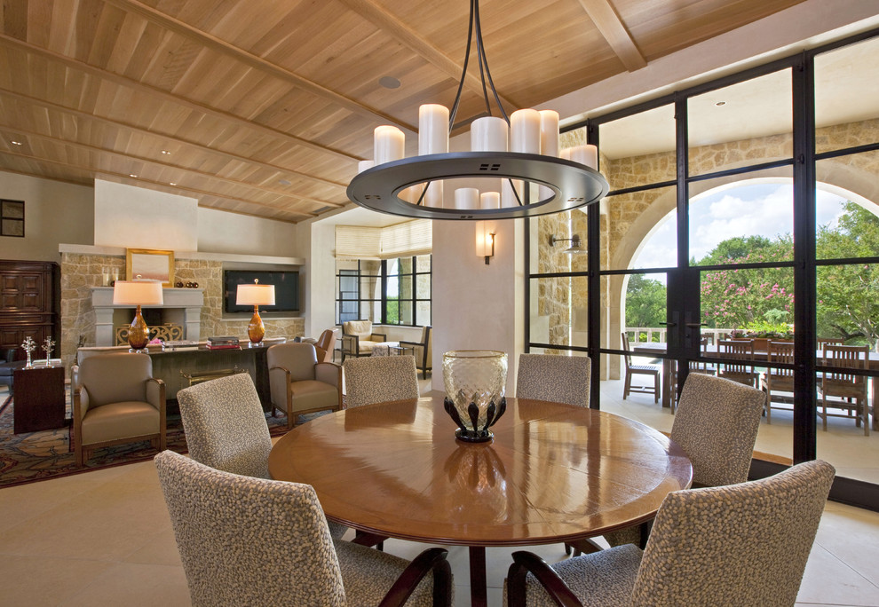 Contemporary open plan dining room in Austin with white walls.