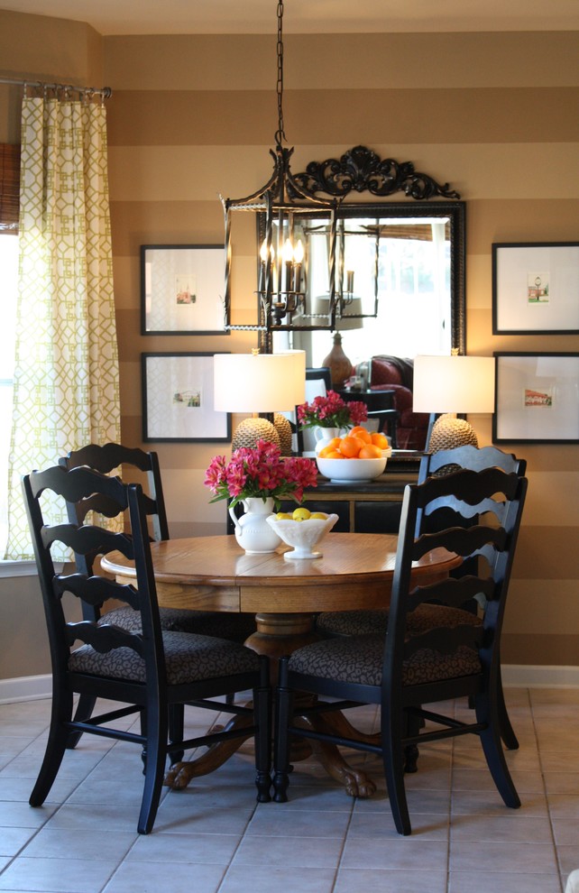 Dining room - contemporary ceramic tile dining room idea in Charlotte with brown walls