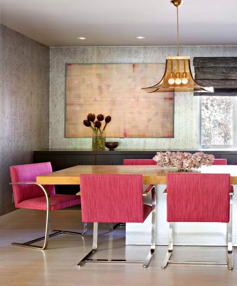 Inspiration for a mid-century modern light wood floor dining room remodel in Los Angeles with metallic walls