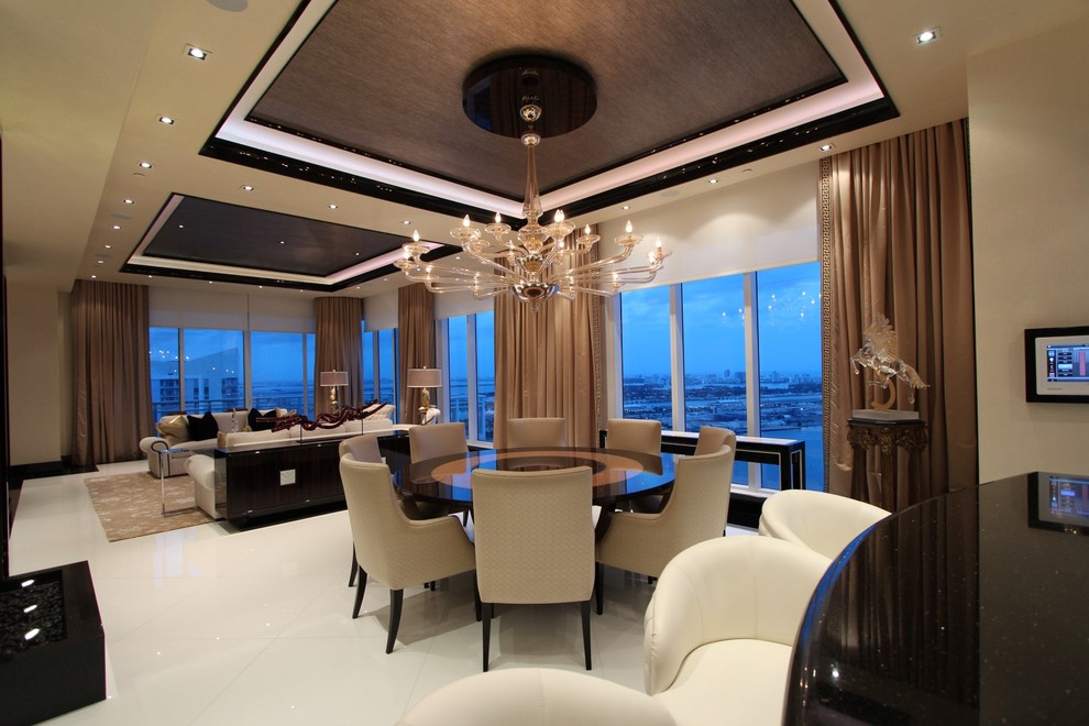 This is an example of a contemporary dining room in Miami.