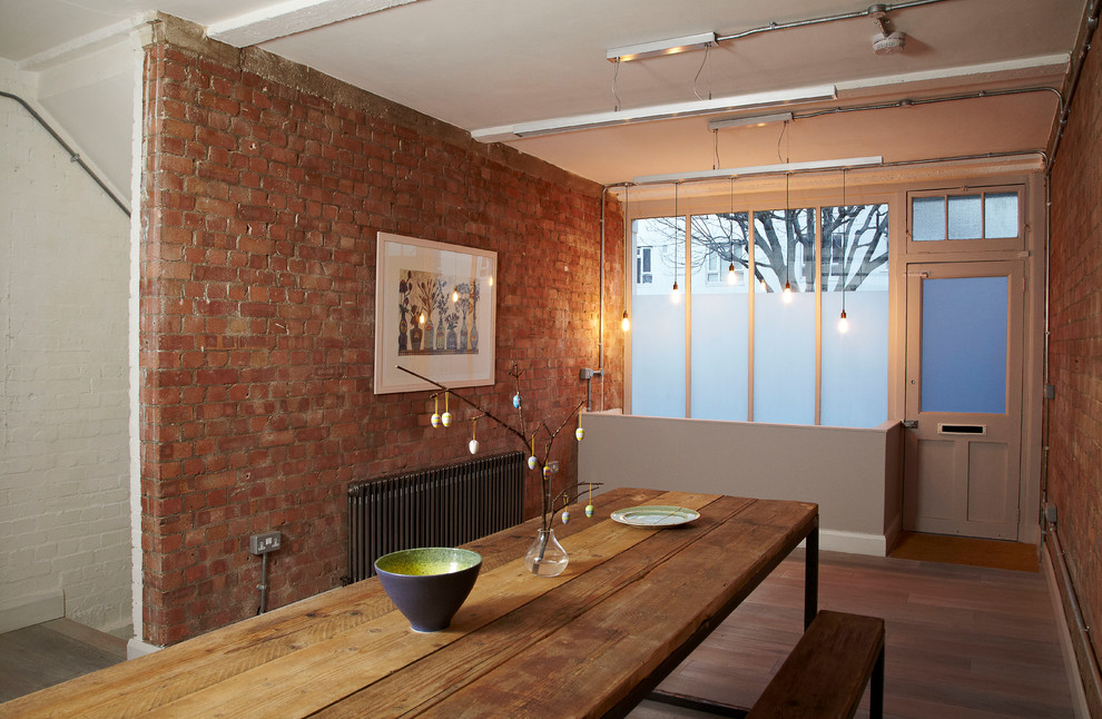 Design ideas for a medium sized urban kitchen/dining room in London with medium hardwood flooring.