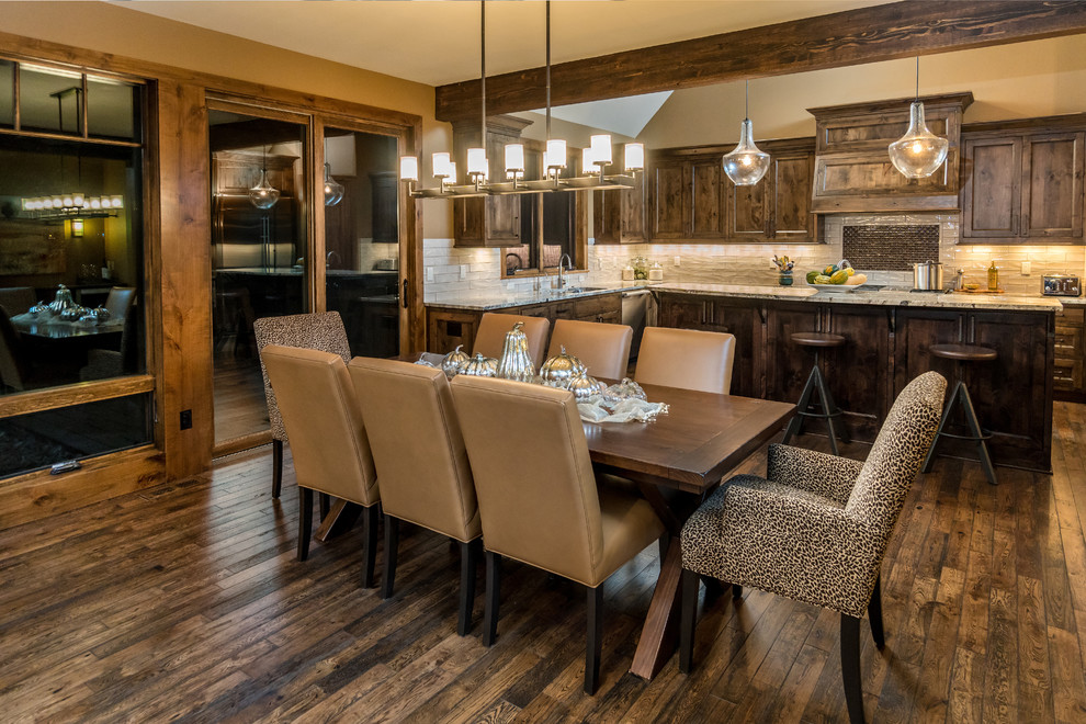 This is an example of a large rustic kitchen/dining room in Other with beige walls, medium hardwood flooring and no fireplace.