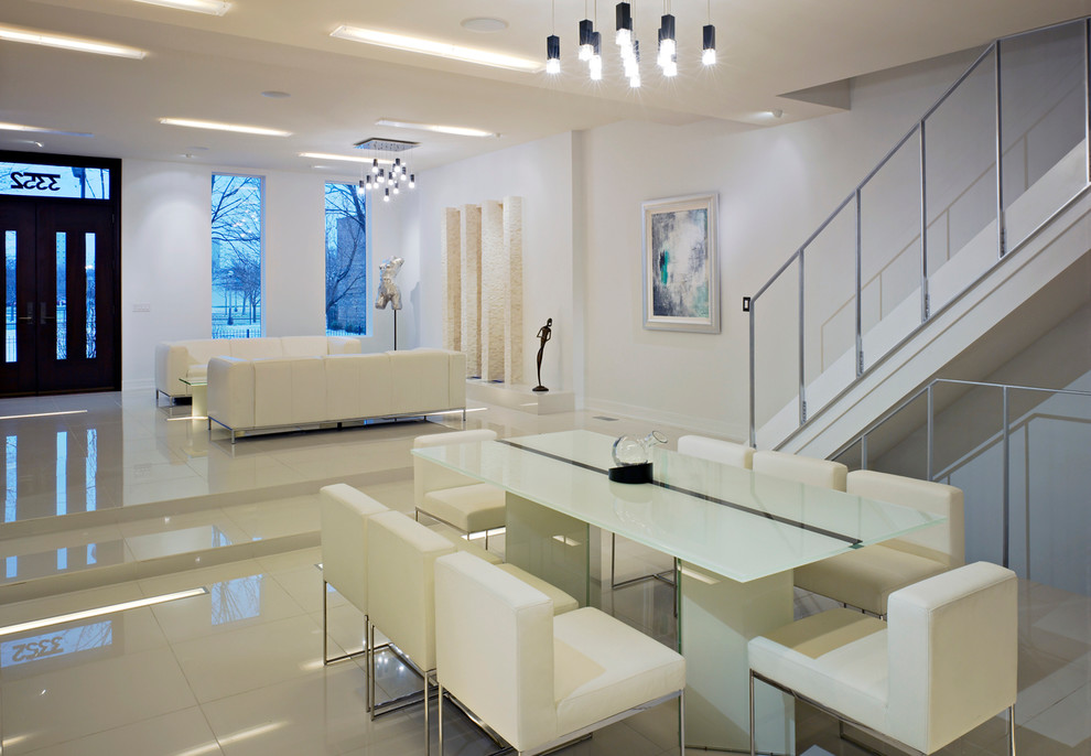 Imagen de comedor moderno extra grande abierto con paredes blancas y suelo de baldosas de porcelana