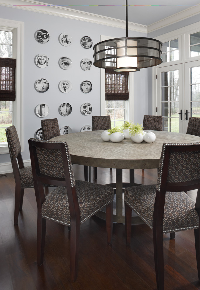 Example of a mid-sized trendy dark wood floor kitchen/dining room combo design in Detroit with blue walls and no fireplace