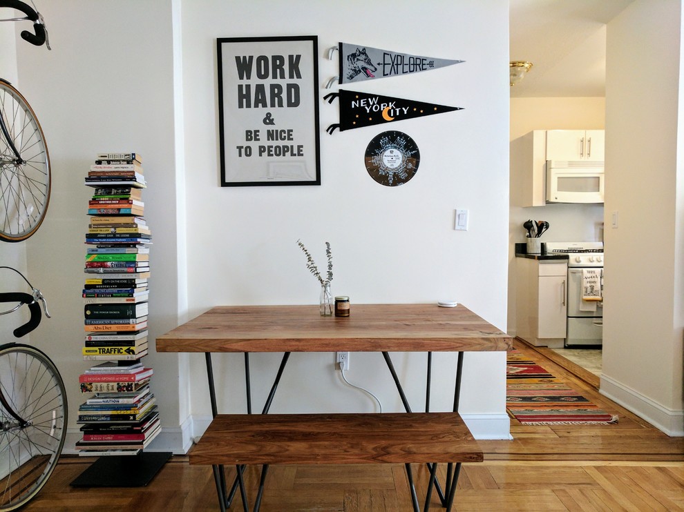 This is an example of a small scandinavian dining room in New York.