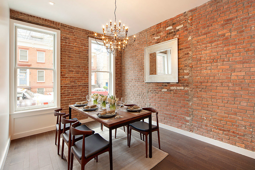 Inspiration for an urban dining room in New York with dark hardwood flooring and no fireplace.