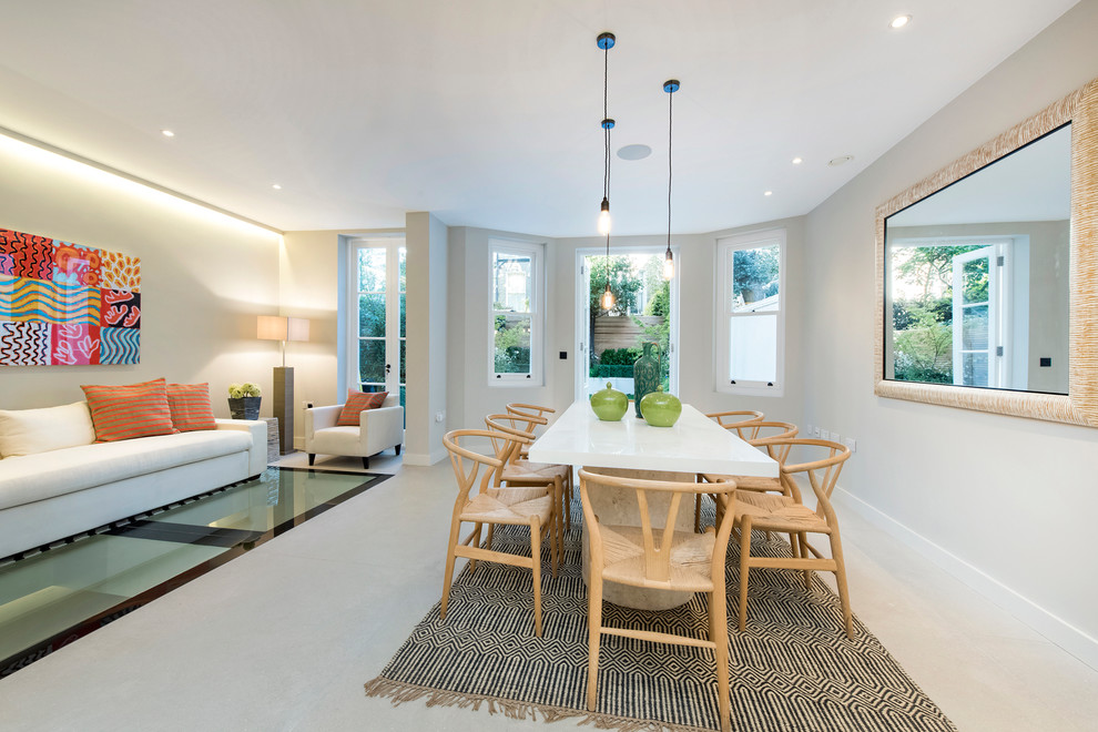 Idées déco pour une salle à manger ouverte sur le salon contemporaine avec aucune cheminée.