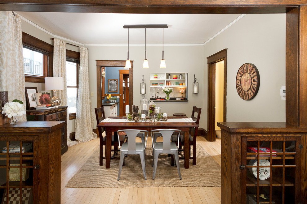 Kitchen/dining room combo - mid-sized craftsman light wood floor kitchen/dining room combo idea in Minneapolis with gray walls