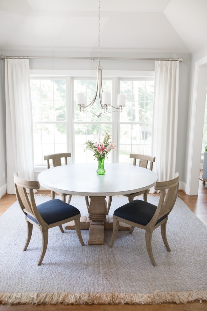 Design ideas for a classic dining room in Philadelphia with grey walls, medium hardwood flooring and brown floors.