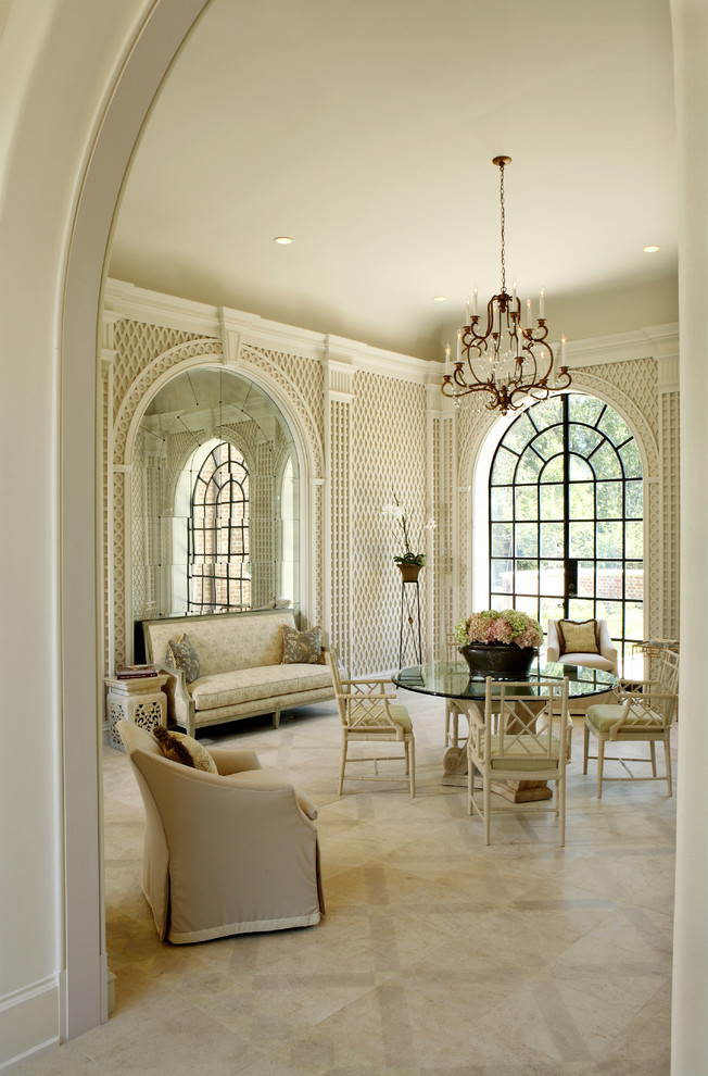 Ornate marble floor enclosed dining room photo in Atlanta with beige walls