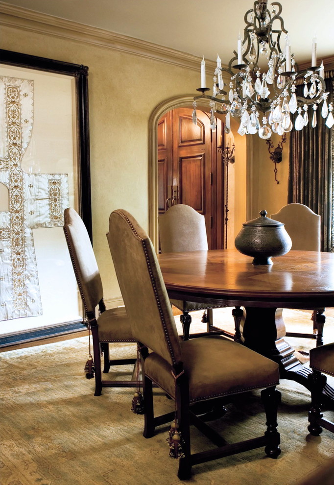 Design ideas for a mediterranean enclosed dining room in Atlanta with beige walls.
